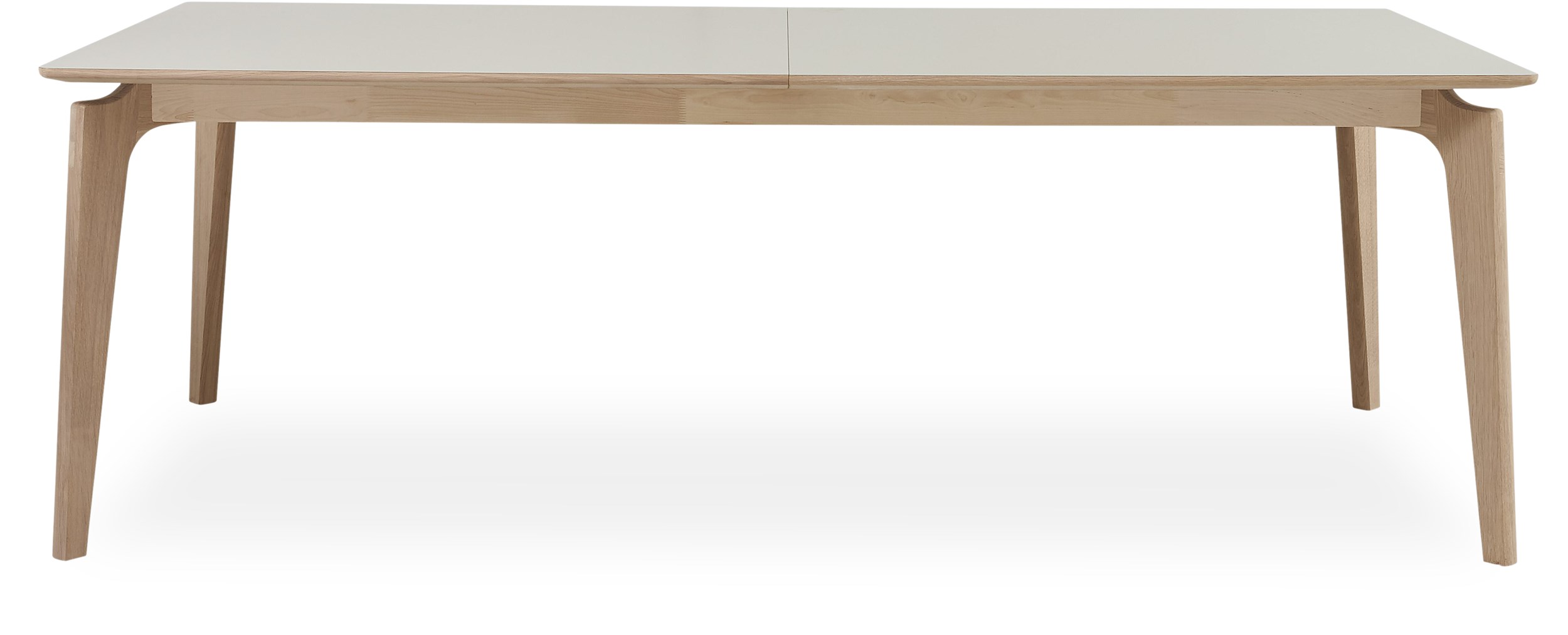 Edge Spisebord 220 x 95 x 74 cm - 101 White højtrykslaminat, kant i hvidpigmenteret matlakeret eg og ben i massiv hvidpigmenteret matlakeret eg.